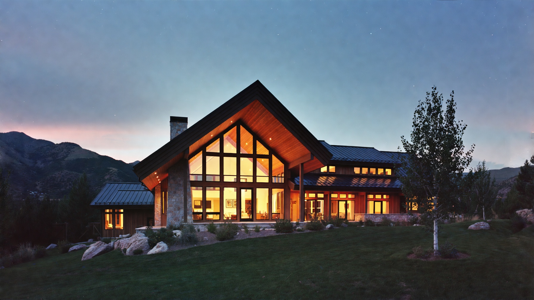 A Utah mountain home at dusk